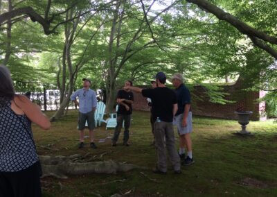 Inspecting the heritage trees at Bellevue House with Dr. Michael Dirr and Adrian Bloom of Bressingham Gardens. In this photo, an ancient fernleaf beech shades the group.